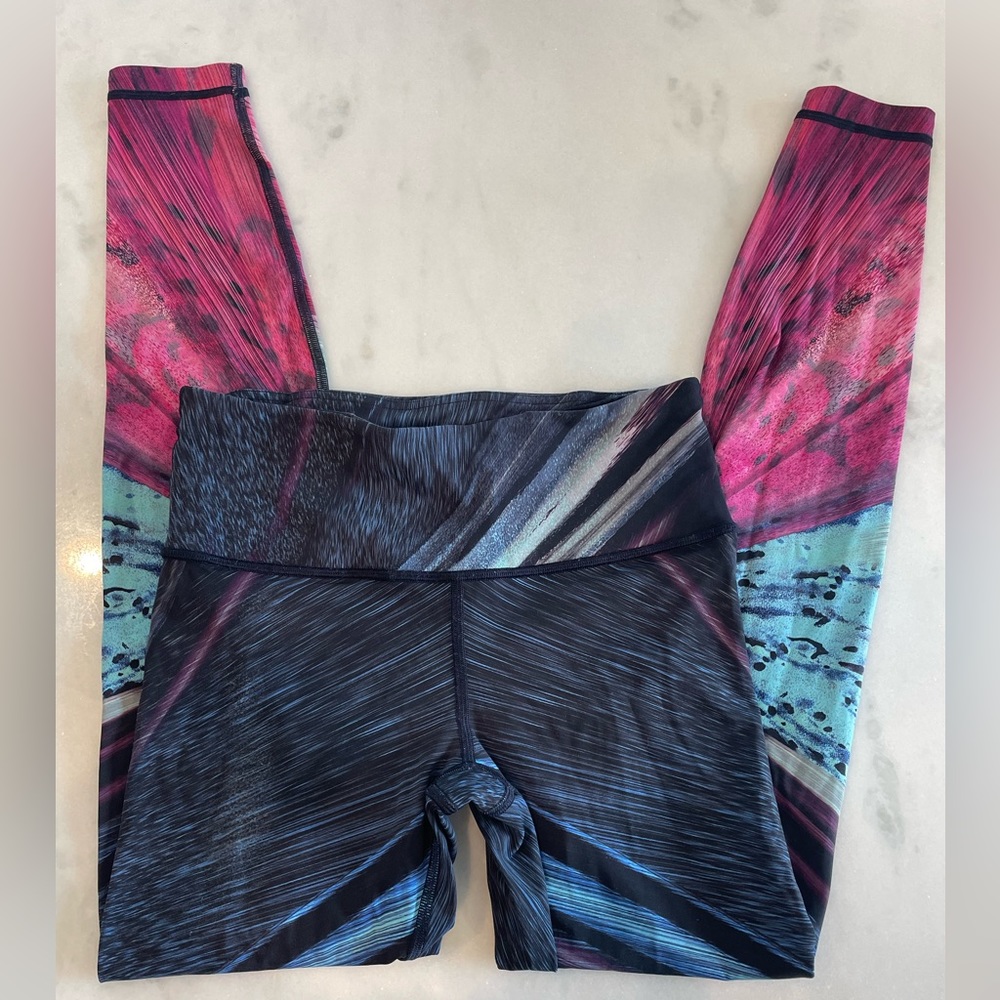Lululemon leggings. EUC. Size 6. Athletic material. Zip pocket on back waist.